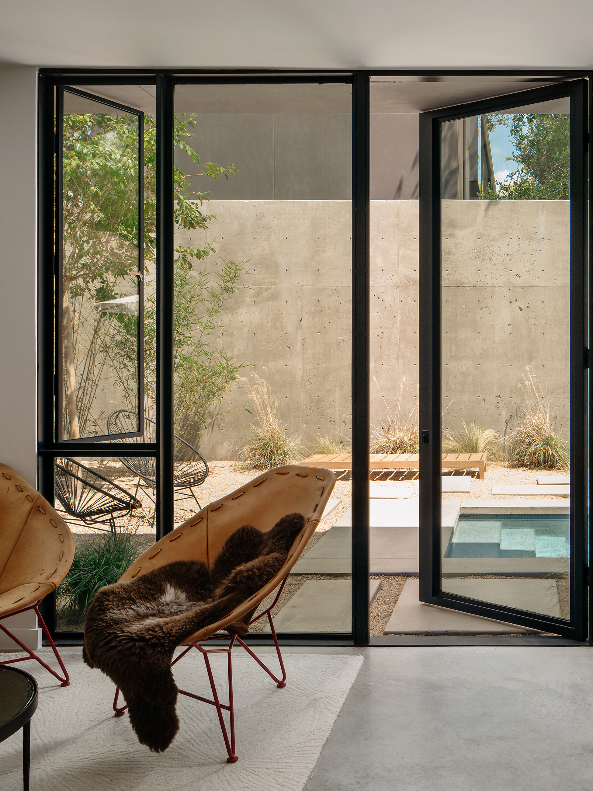 Living room with concrete feature wall